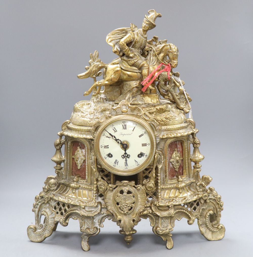 A German brass figural mantel timepiece, height 43cm